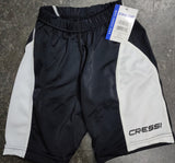 A pair of Cressi brand lady short pants in black and white color blocks, with a tag attached.